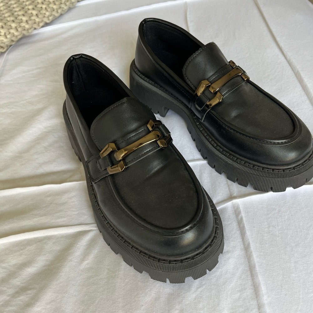 Black Loafers with Gold Accent